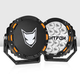 Two black and orange lights with a brand logo on a white background