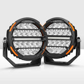 Pair of round LED work lights with LIGHTFOX branding on a white background
