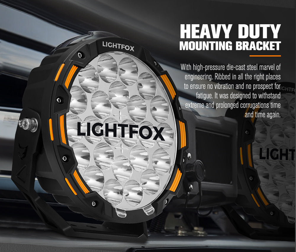 Lightfox off-road light with heavy-duty mounting bracket on a vehicle background Lightfox off-road light with heavy-duty mounting bracket on a vehicle background