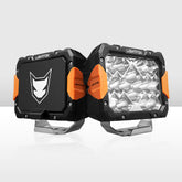 Two LED work lights with orange accents on a white background