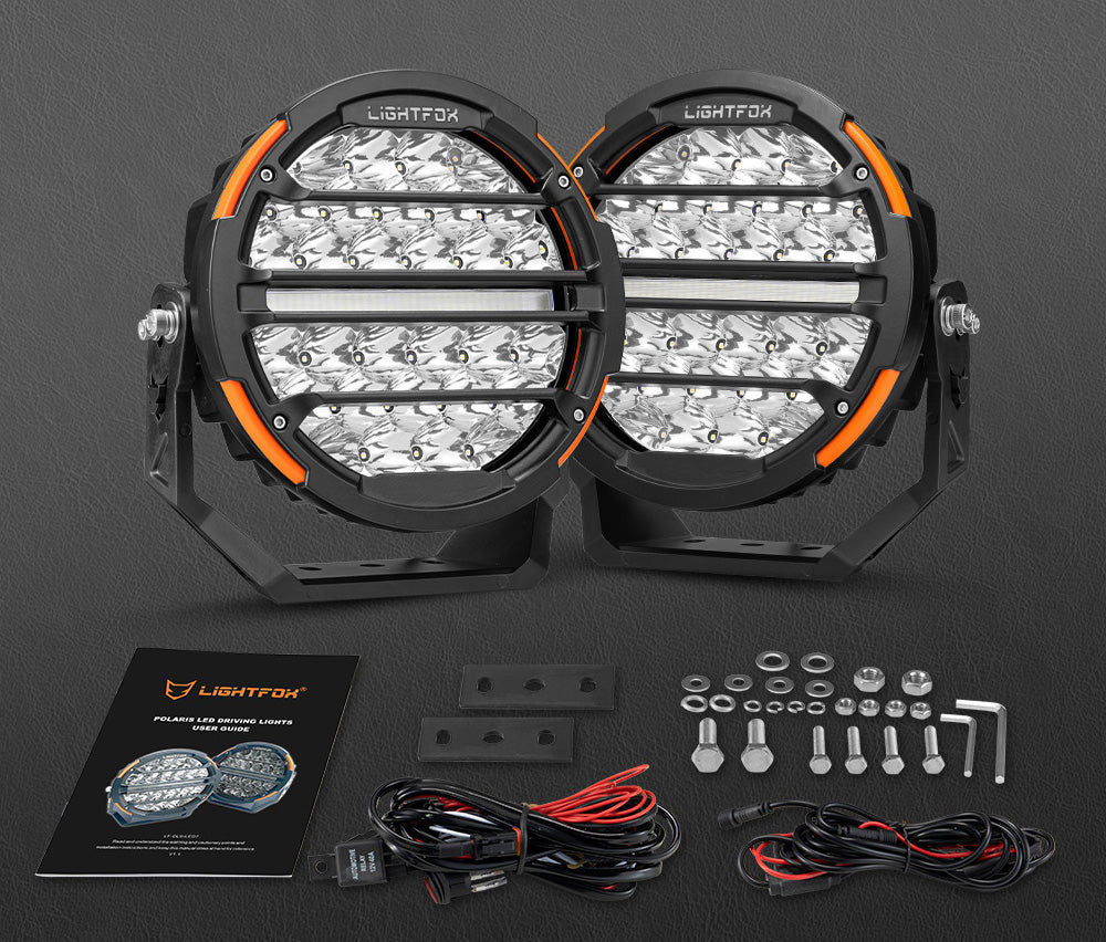 Pair of Lightfox LED driving lights with installation hardware on a dark background Pair of Lightfox LED driving lights with installation hardware on a dark background