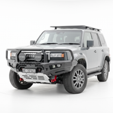 Silver Toyota Prado SUV with off-road bullbar, equipment on a white background