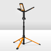 Orange and black adjustable LED camping light stand on a white background