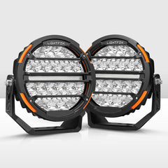 Pair of round LED work lights with LIGHTFOX branding on a white background