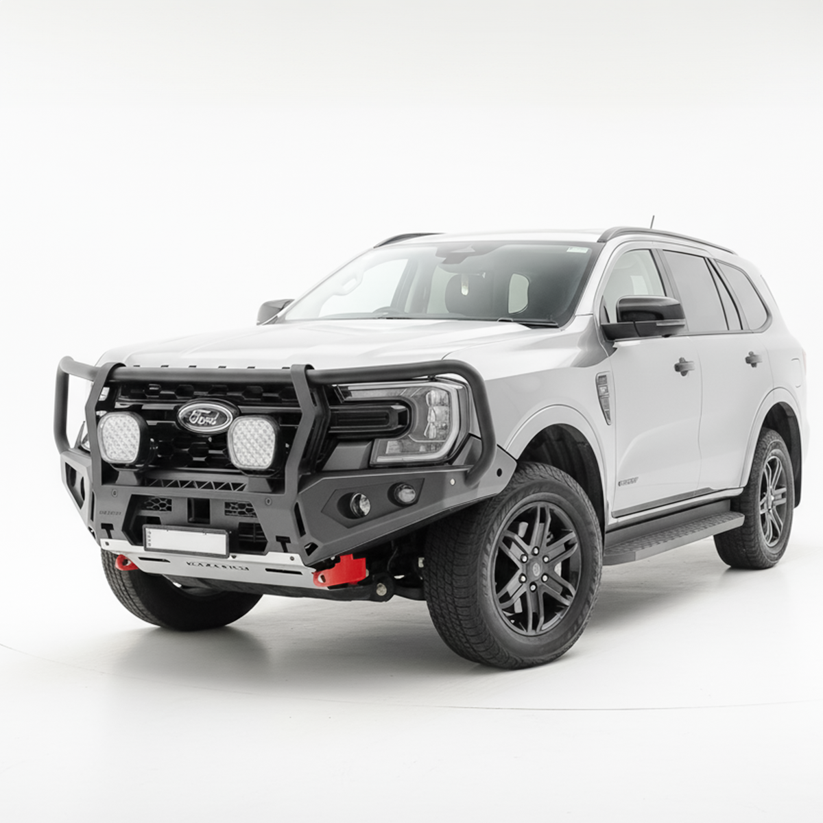 Grey Ford Everest SUV with a black grille and Rockarmor bumper bull bar on a white background