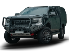 A dark grey Ford Ranger pickup truck bakkie with a custom Rockarmor black metal front bumper guard and a matching dark hardtop canopy, shown from a three-quarter front angle on a white background with a soft shadow.