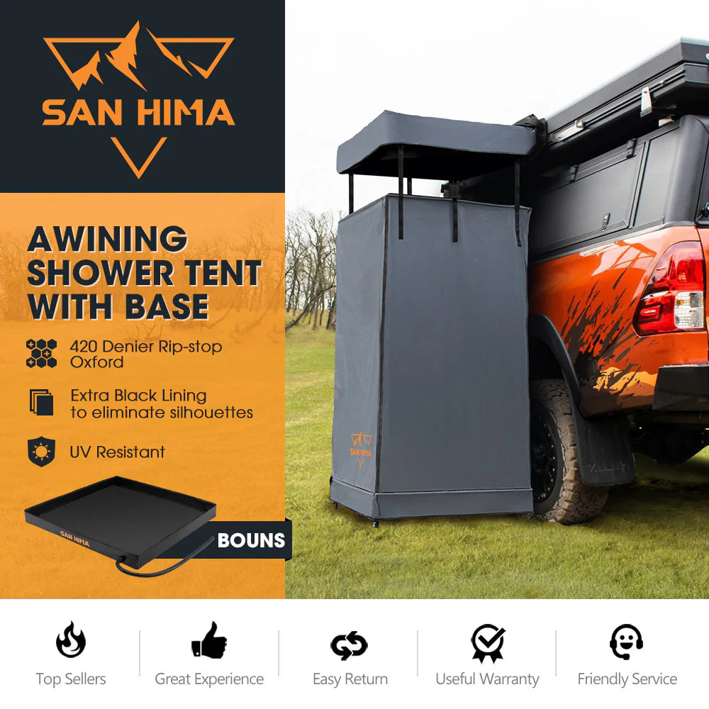 San Hima awning shower tent with base attached to a vehicle in an outdoor setting.