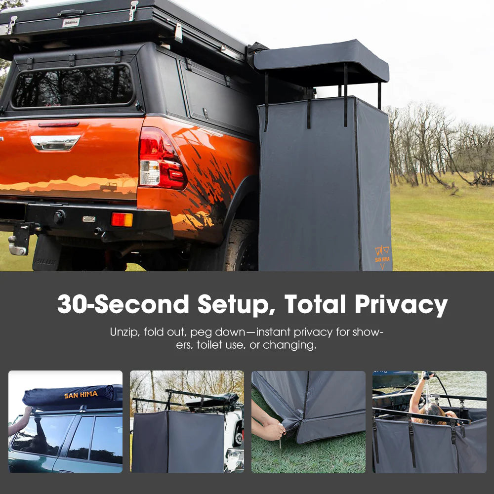 San Hima shower awning next to a bakkie, showcasing privacy features and setup in an outdoor camping environment