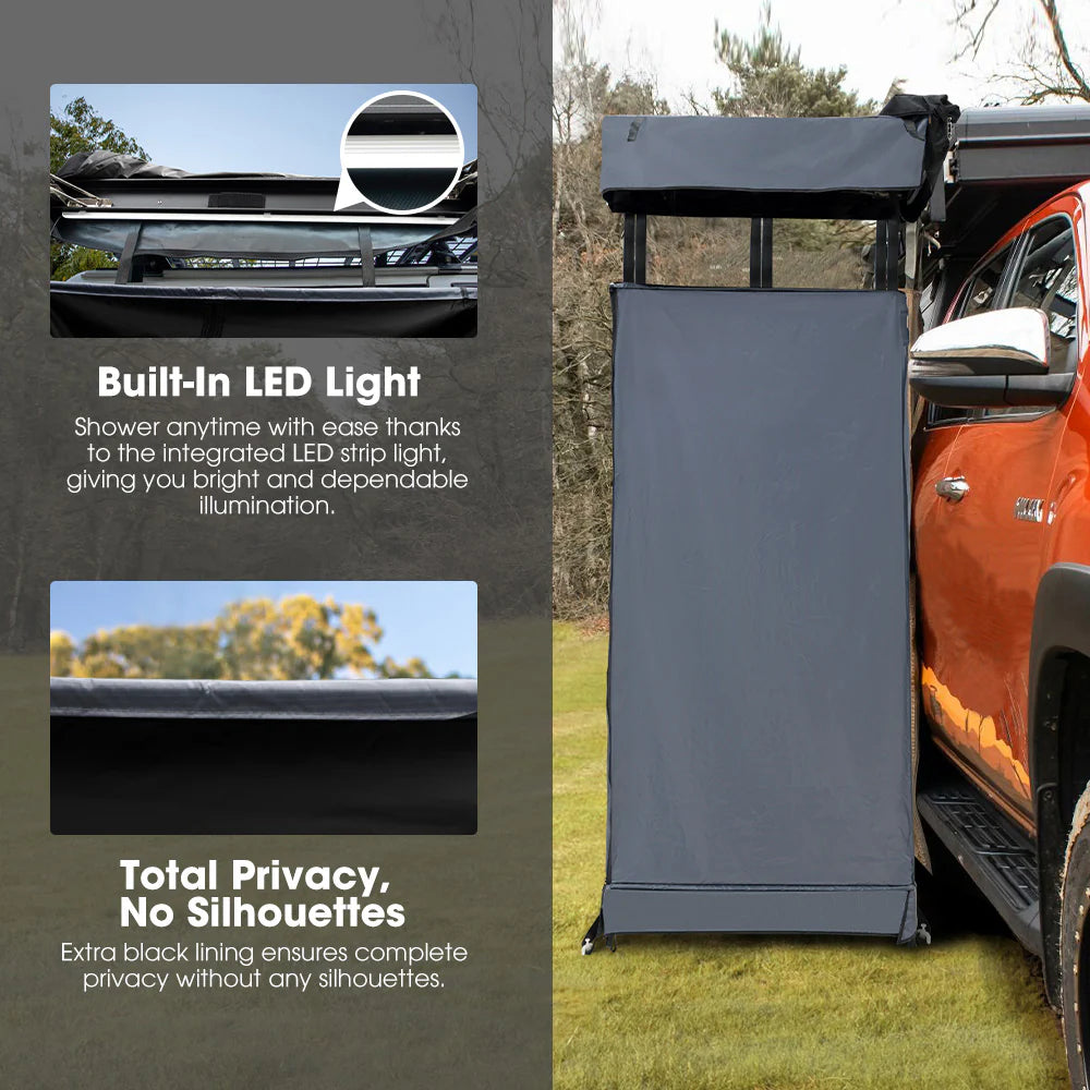 Camp Shower Awning with built-in LED light and total privacy feature, attached to a vehicle outdoors.