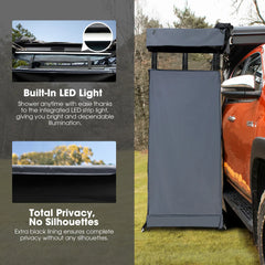 Camp Shower Awning with built-in LED light and total privacy feature, attached to a vehicle outdoors.