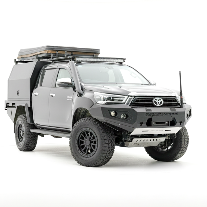 Gray Toyota Hilux bakkie with roof rack and Rockarmor bull bar bumper on a white background