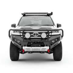 Front view of a Toyota SUV with additional lighting, Rockarmor bullbar and equipment on a white background