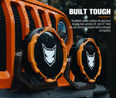 Close-up of a vehicle grille with protective brackets and 'AkzoNobel' branding.