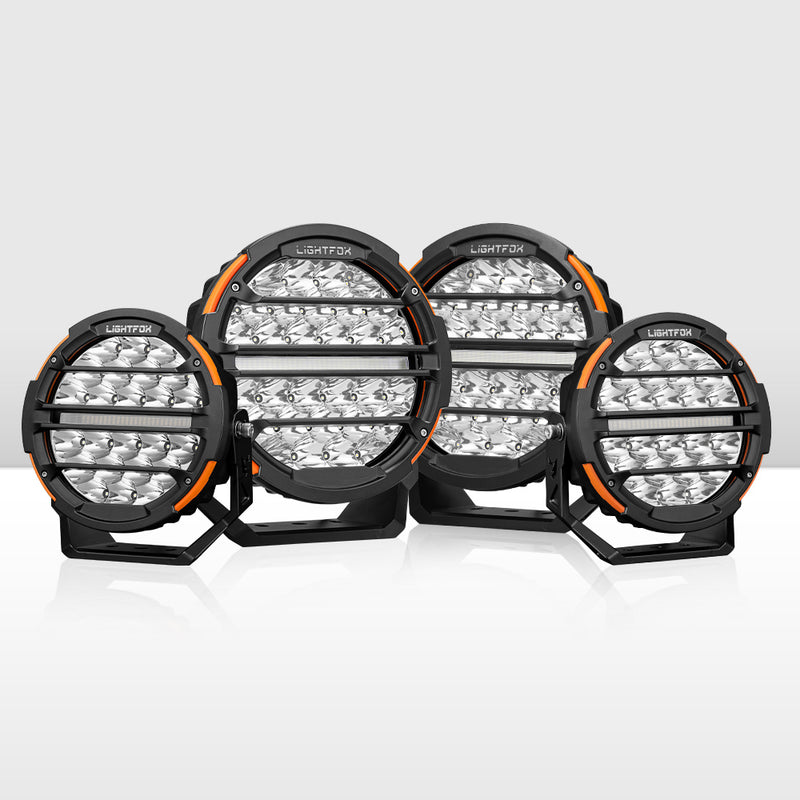 Set of round LED lights with black and orange accents on a white background
