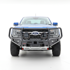 Front view of a blue Ford Ranger bakkie with a large Rockarmor bullbar on a white background