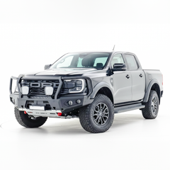 Gray Ford Ranger Raptor bakkie pickup truck with Rockarmor front bumper bull bar on a white background