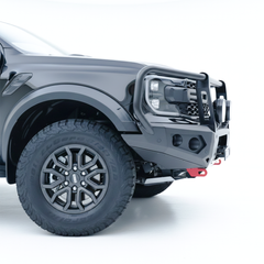 Gray Ford Ranger Raptor bakkie pickup truck with Rockarmor front bumper bull bar side view on a white background