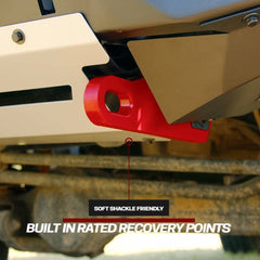 Mechanical component with red shackle on a vehicle, labeled 'Soft Shackle Friendly' and 'Built In Rated Recovery Points'.