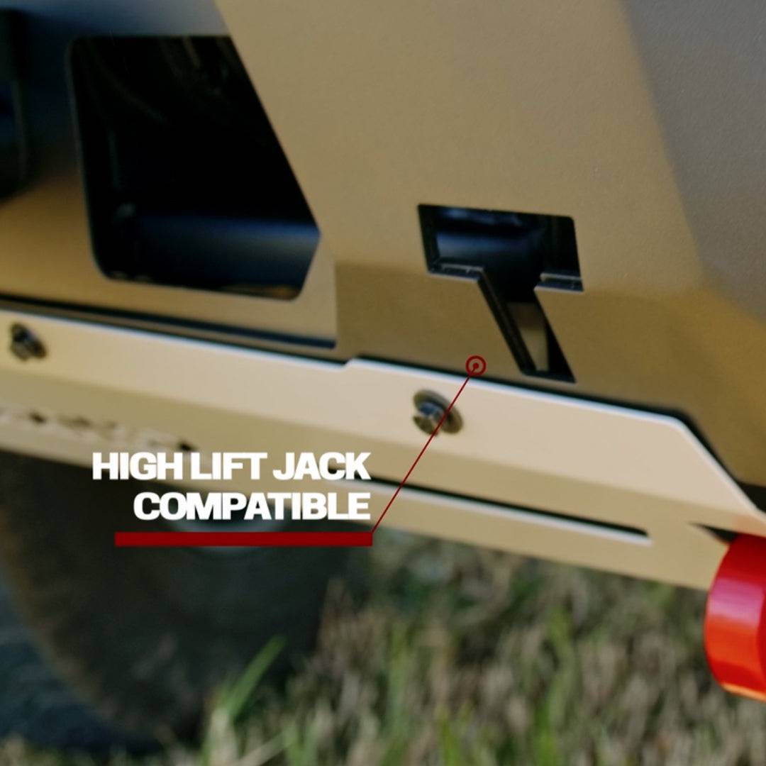 High lift jack compatible feature on a Toyota vehicle with grass in the background