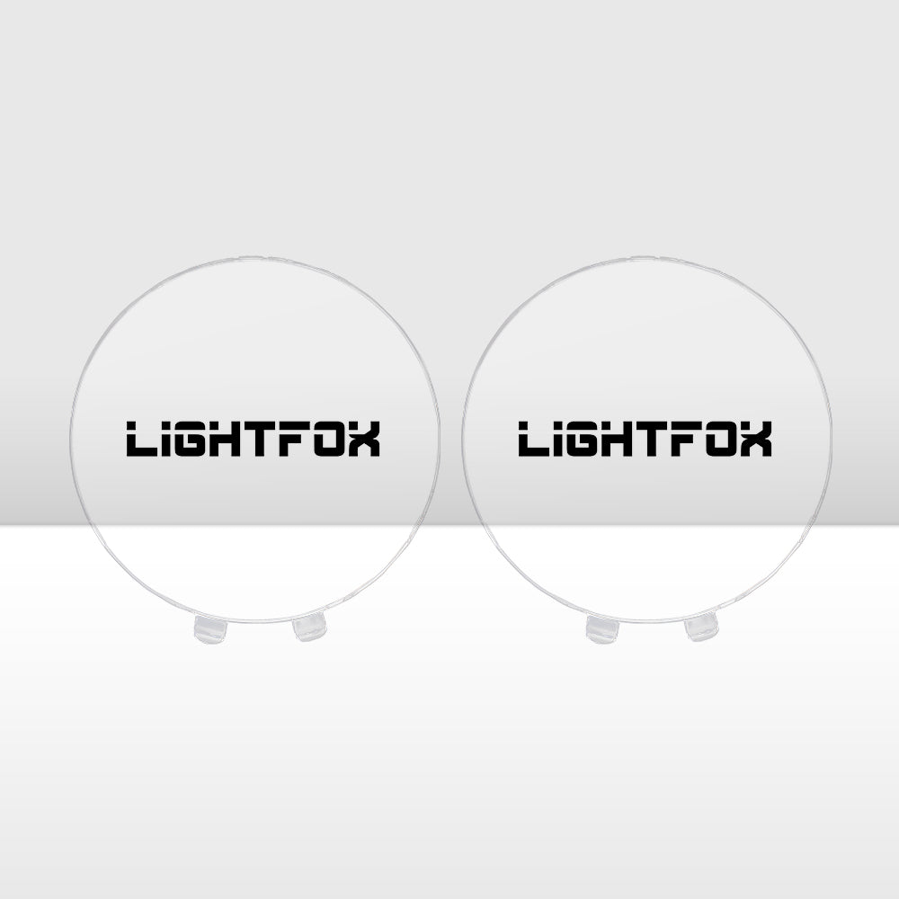 Two round driving light covers with Lightfox branding on a white background