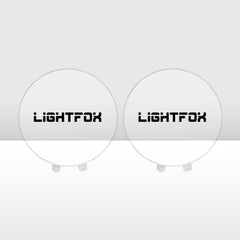 Two round driving light covers with Lightfox branding on a white background