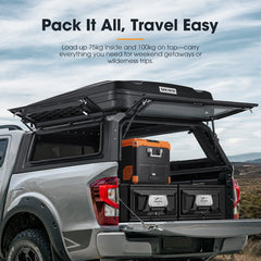 Truck bed with open cargo area and storage boxes, featuring text about load capacity and travel ease.