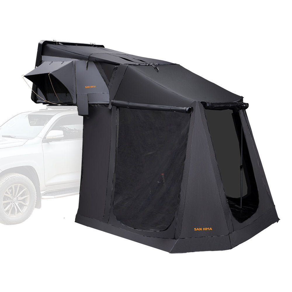 Black San Hima Jervis Rooftop Tent, and Annex Camping Shade attached to a white SUV on a white background.