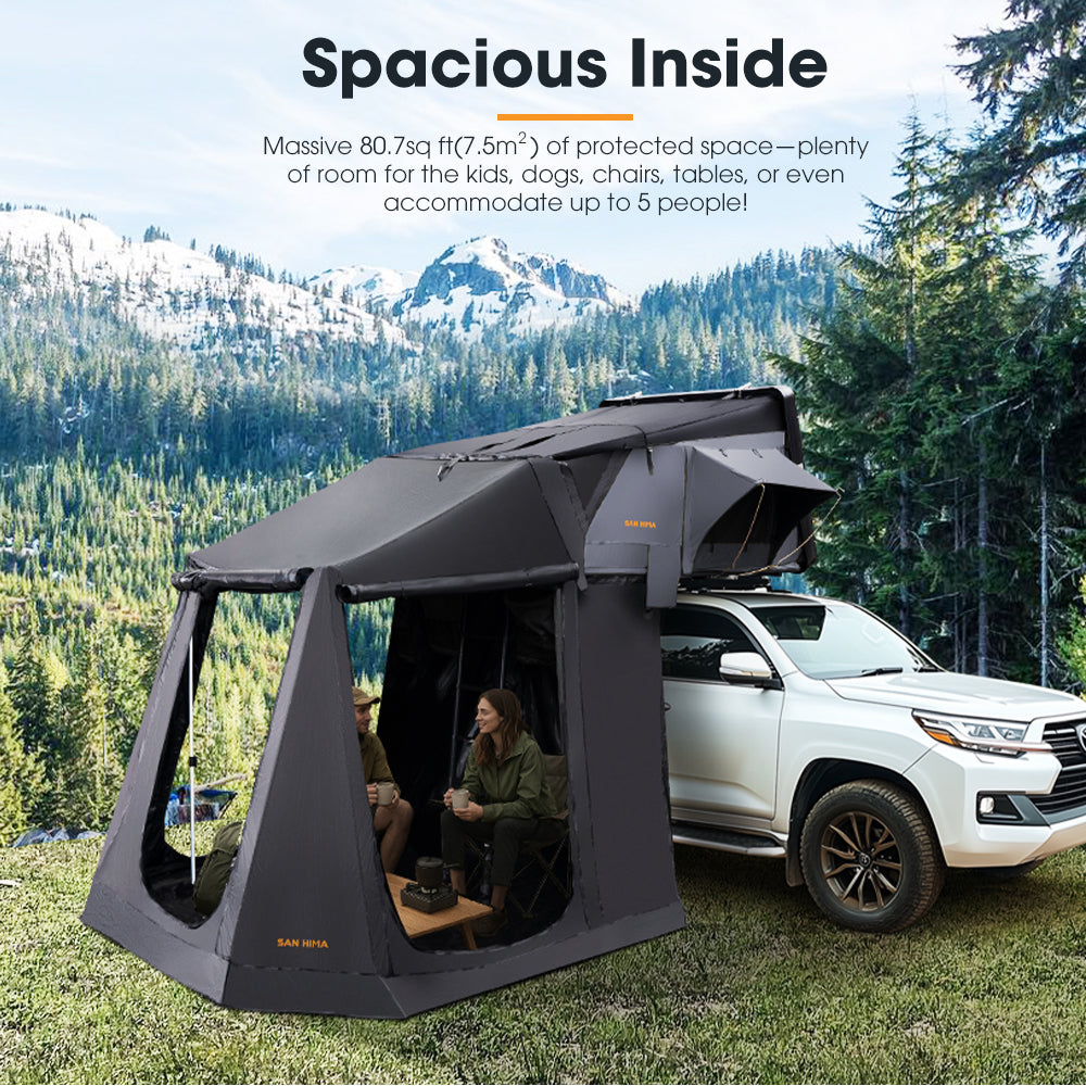 Black San Hima Jervis Rooftop Tent, and Annex Camping Shade with people inside, set against a mountainous landscape.