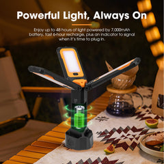 Portable camping light with battery indicator on a table with food items
