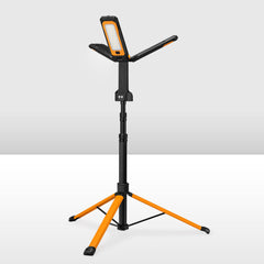 Orange and black adjustable LED camping light stand on a white background