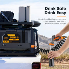 Water filtration system on a vehicle with a person using a water bottle, set against a desert landscape.